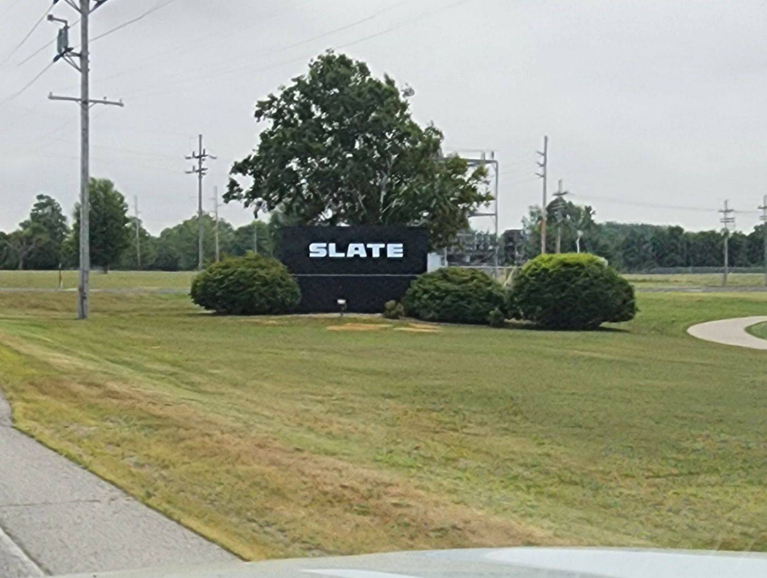Slate Auto Pickup Truck Slate Auto installs new monument company logo sign at Warsaw assembly plant 519834160_24610612591879790_7078718842244348827_n