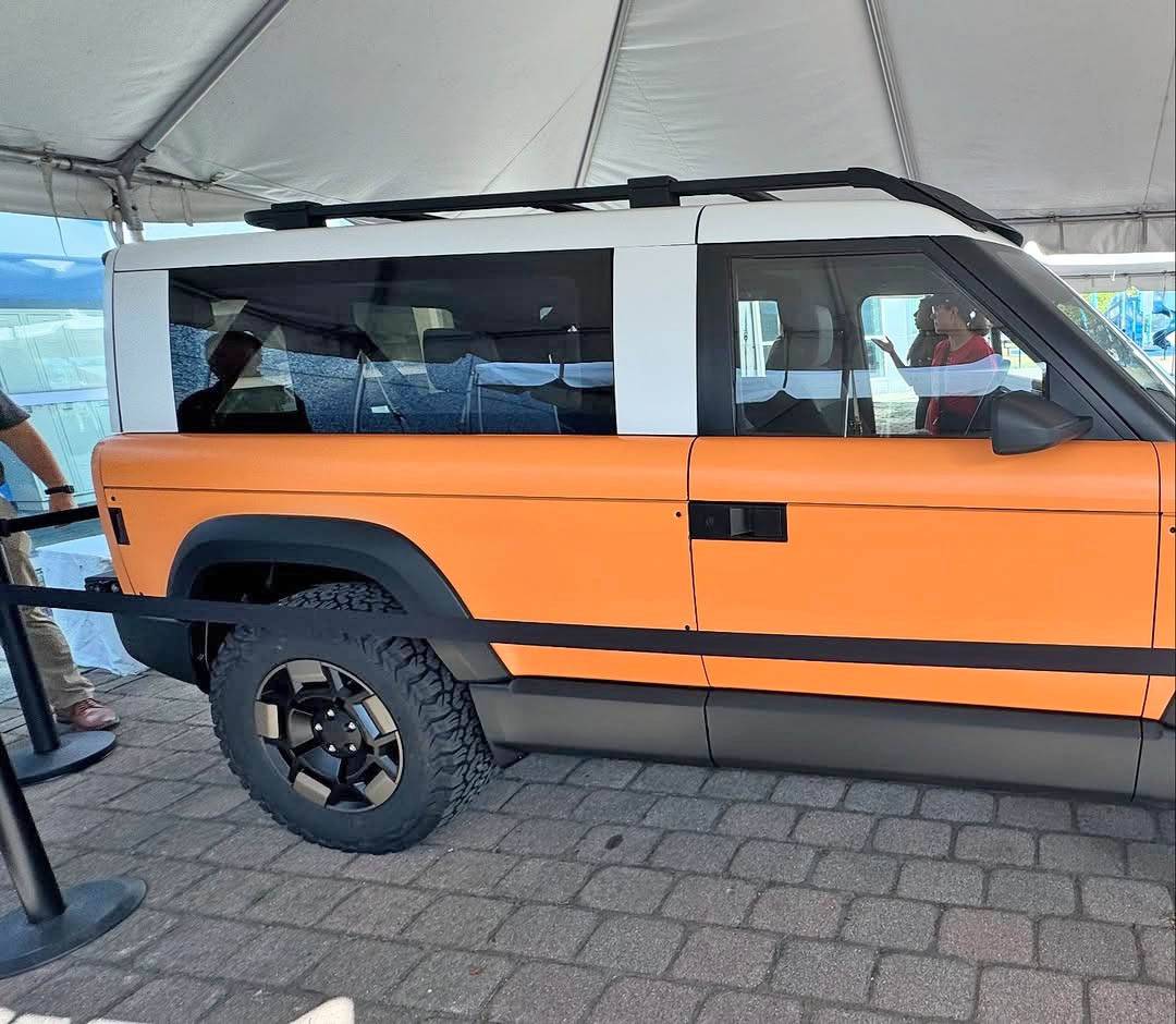 Slate Auto Pickup Truck Orange Slate SUV with 2" inch lift, white roof, roof rack - photos from Cleveland Ohio orange wrap slate suv white roof 2