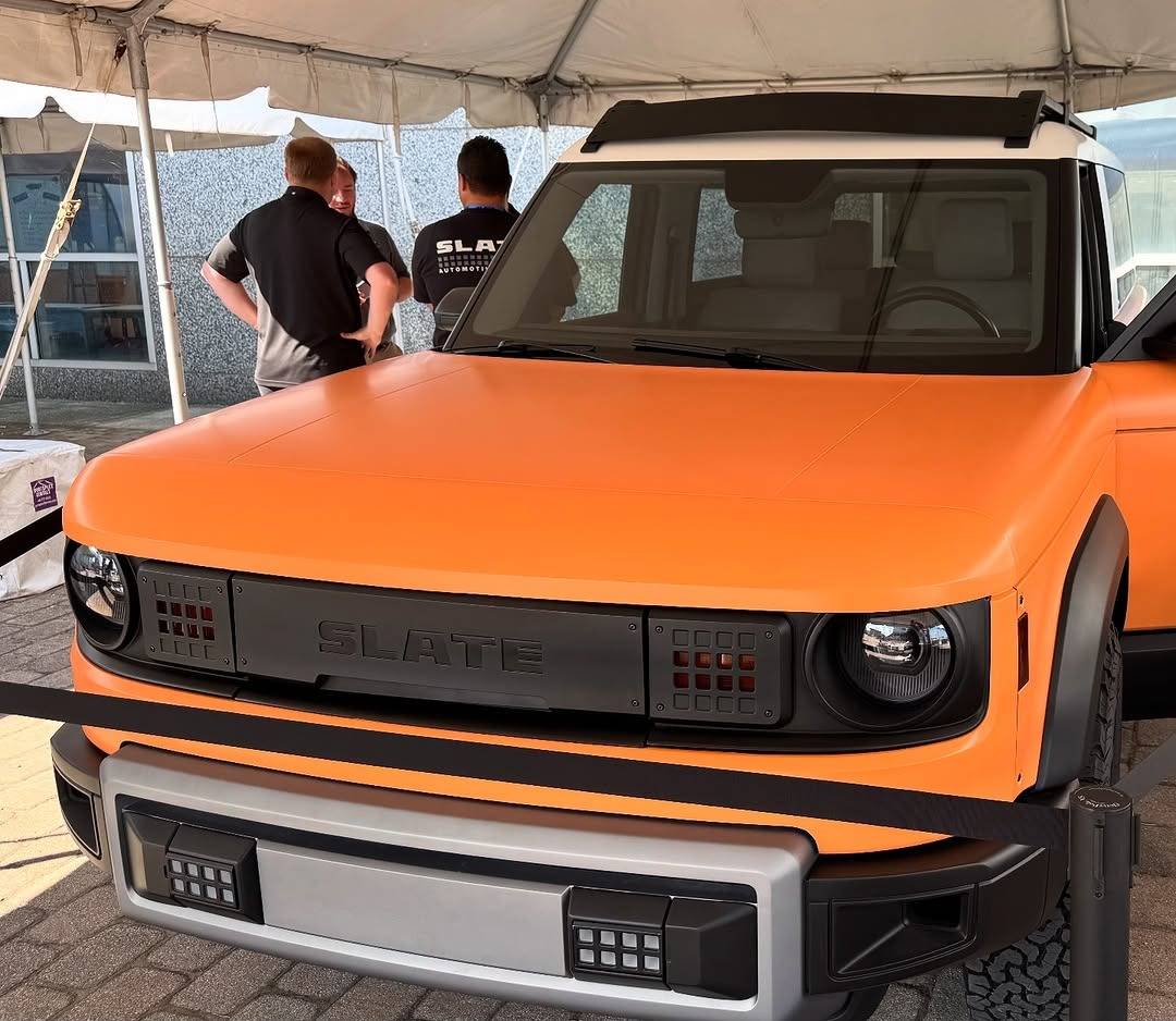 Slate Auto Pickup Truck Orange Slate SUV with 2" inch lift, white roof, roof rack - photos from Cleveland Ohio orange wrap slate suv white roof 4