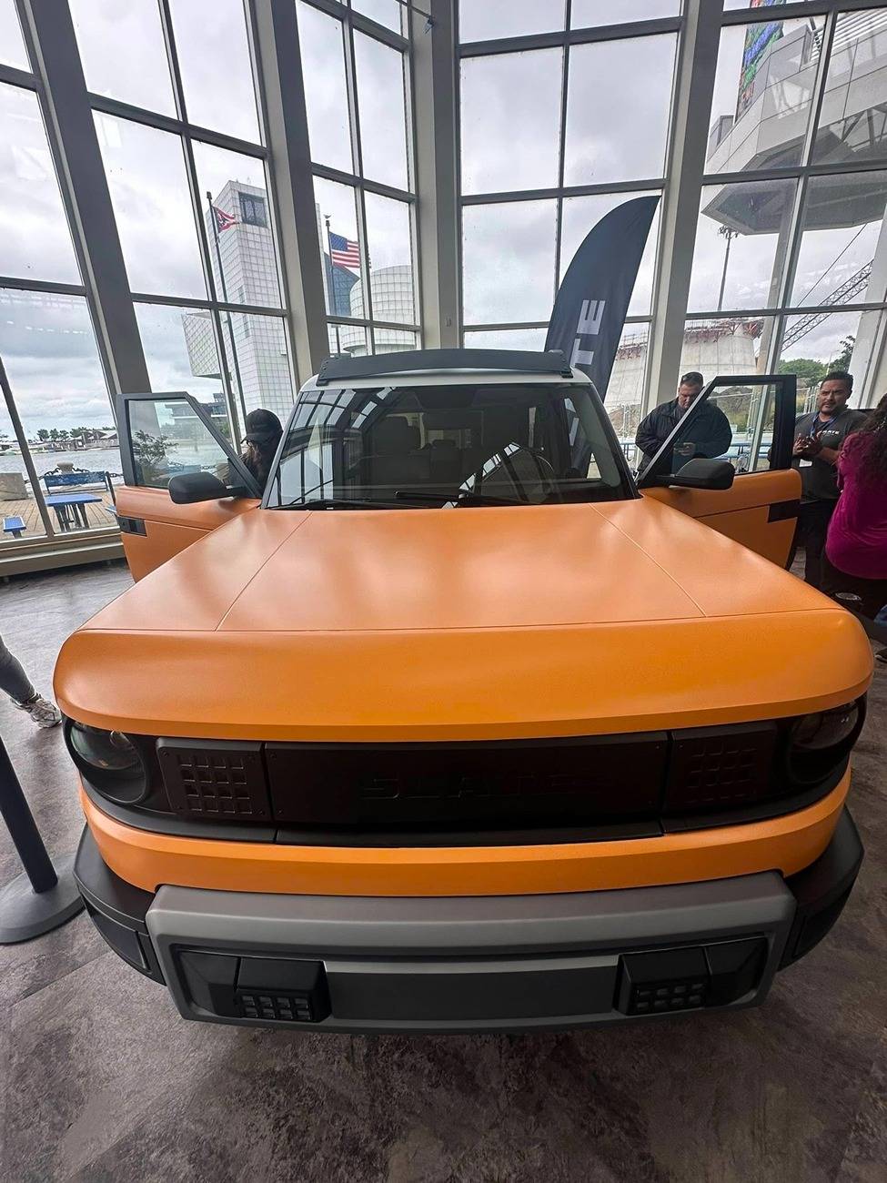 Slate Auto Pickup Truck Orange Slate SUV with 2" lift, BFG All-Terrain AT T/A tires, white roof, roof rack - photos from Cleveland Ohio Slate suv truck 2%22 inch lift with white roof and orange body wrap 1