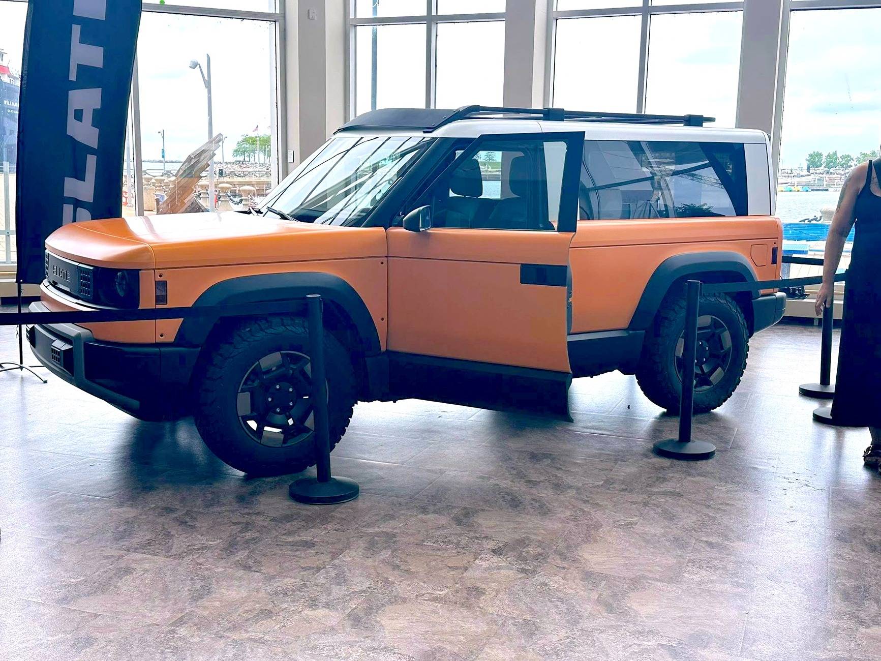 Slate Auto Pickup Truck Orange Slate SUV with 2" lift, BFG All-Terrain AT T/A tires, white roof, roof rack - photos from Cleveland Ohio Slate suv truck 2%22 inch lift with white roof and orange body wrap 3