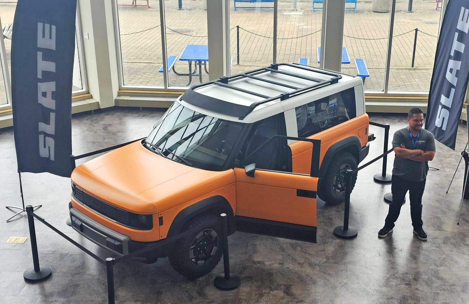 Slate Auto Pickup Truck Orange Slate SUV with 2" inch lift, white roof, roof rack - photos from Cleveland Ohio slate suv truck orange wrap white roof
