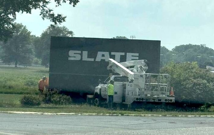 Slate Auto installs new monument company logo sign at Warsaw assembly plant